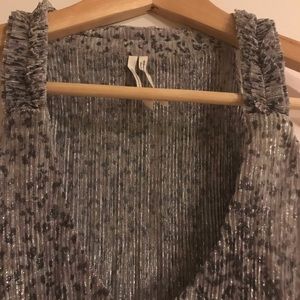 Shimmering Anthropology Top. Perfect for holidays.